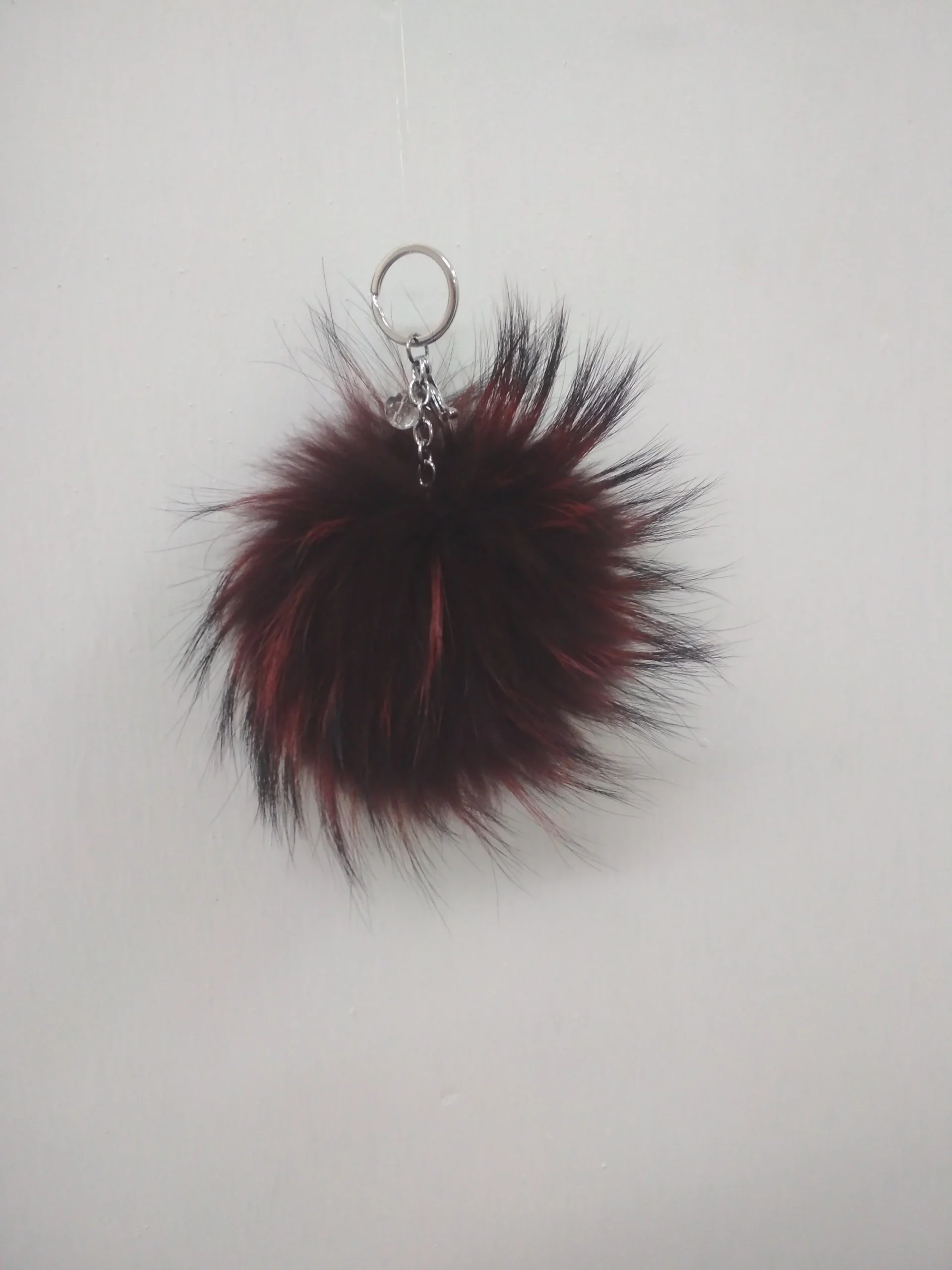 Fur pon pon keychain accessories dark bordo color,